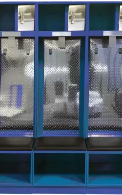 Three blue Flex Elite open-front team lockers with padded seats and diamond-plate backs